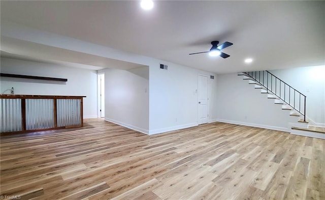1628 Eagle Crest Dr, Pfafftown, NC 27040 - unfurnished living room featuring light wood-style floors, stairway, ceiling fan, and recessed lighting