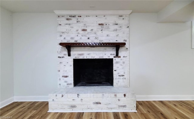 1628 Eagle Crest Dr, Pfafftown, NC 27040 - detailed view of wood finished floors and a brick fireplace