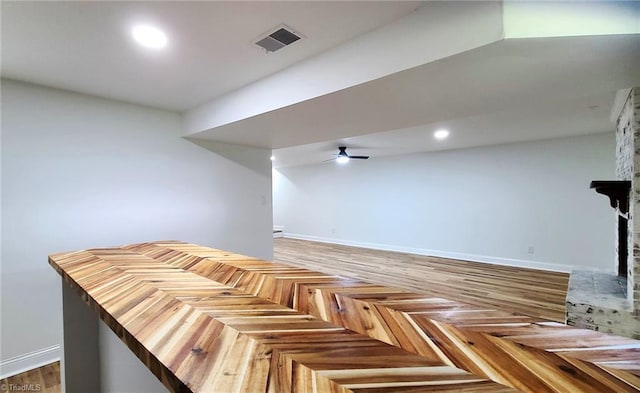 1628 Eagle Crest Dr, Pfafftown, NC 27040 - bar area featuring a fireplace and a ceiling fan