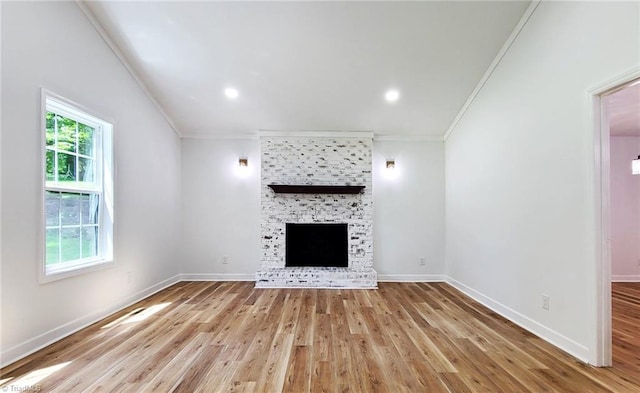 1628 Eagle Crest Dr, Pfafftown, NC 27040 - unfurnished living room featuring crown molding, wood finished floors, a large fireplace, and recessed lighting