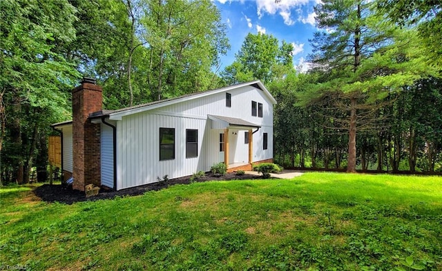 1628 Eagle Crest Dr, Pfafftown, NC 27040 - modern inspired farmhouse with a chimney and a front yard