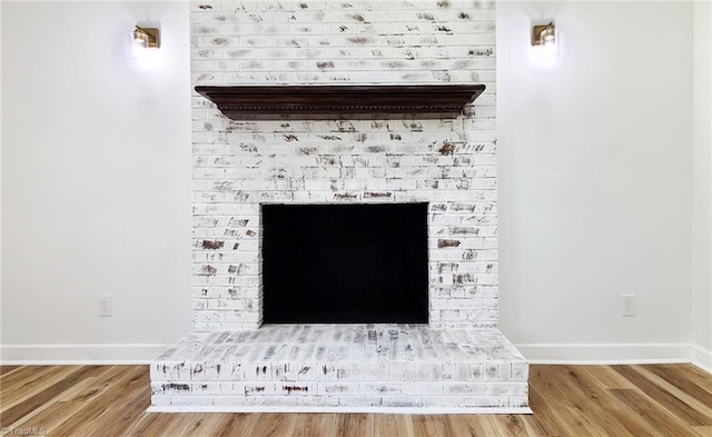 1628 Eagle Crest Dr, Pfafftown, NC 27040 - detailed view of wood finished floors and a brick fireplace