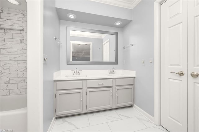 191 Fairway Dr, Advance, NC 27006 - bathroom with marble look tile flooring, baseboards, crown molding, double vanity, and recessed lighting
