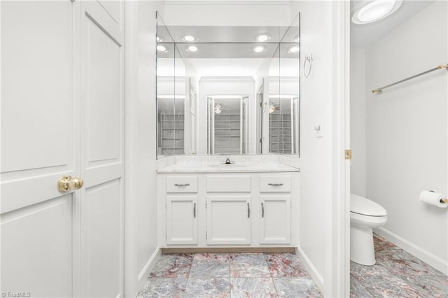 191 Fairway Dr, Advance, NC 27006 - bathroom with vanity, toilet, and baseboards