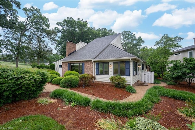 191 Fairway Dr, Advance, NC 27006 - view of front of home with a chimney and a shingled roof