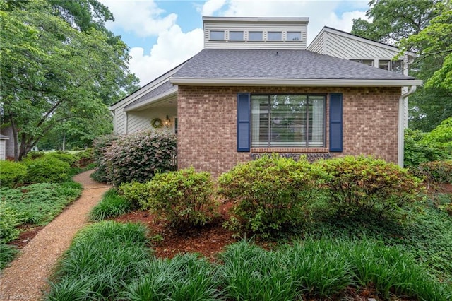 191 Fairway Dr, Advance, NC 27006 - view of side of home with brick siding and a shingled roof