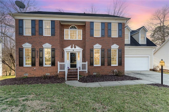 view of front facade with a garage, crawl space, brick siding, and driveway