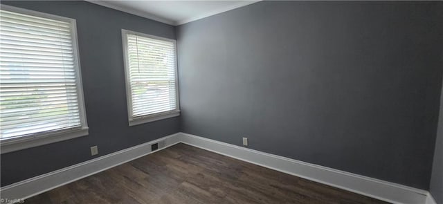 1904 E Innes St, Salisbury, NC 28146 - empty room featuring dark wood finished floors and crown molding