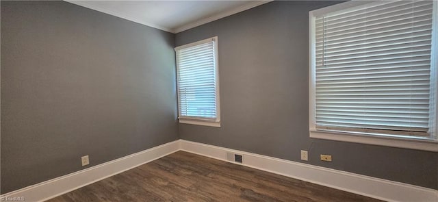 1904 E Innes St, Salisbury, NC 28146 - empty room with dark wood finished floors and ornamental molding