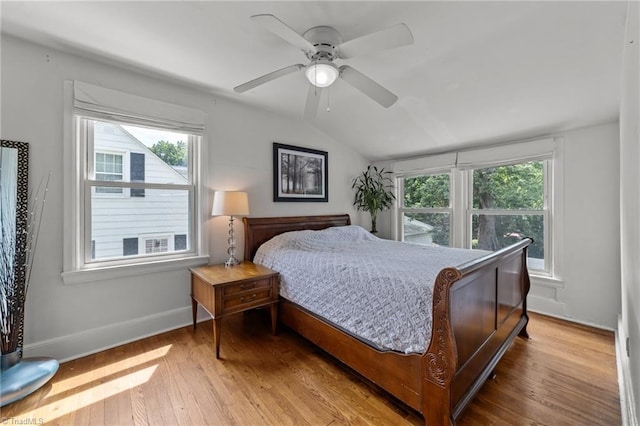 2607 Sherwood St, Greensboro, NC 27403 - bedroom with vaulted ceiling, hardwood / wood-style floors, and ceiling fan