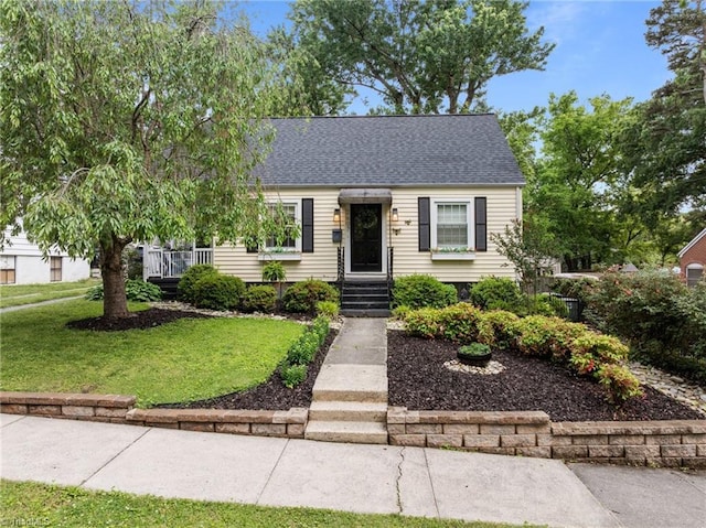 2607 Sherwood St, Greensboro, NC 27403 - view of front of property featuring a front yard and roof with shingles
