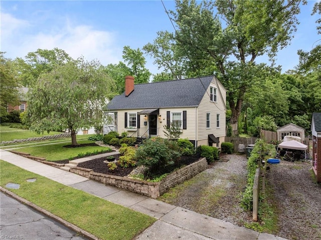 2607 Sherwood St, Greensboro, NC 27403 - view of front of property featuring a chimney, roof with shingles, and driveway