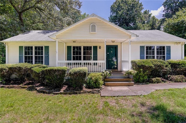 5201 Harvey Rd, Jamestown, NC 27282 - single story home featuring covered porch and a front lawn