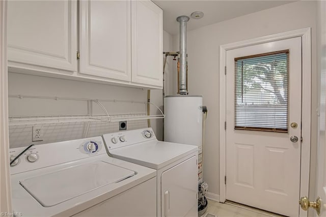 5201 Harvey Rd, Jamestown, NC 27282 - laundry area featuring cabinet space, washing machine and clothes dryer, and water heater