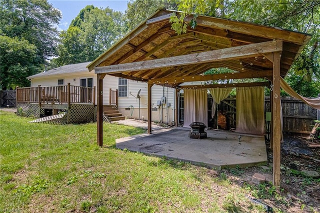 5201 Harvey Rd, Jamestown, NC 27282 - rear view of house with a deck and a patio