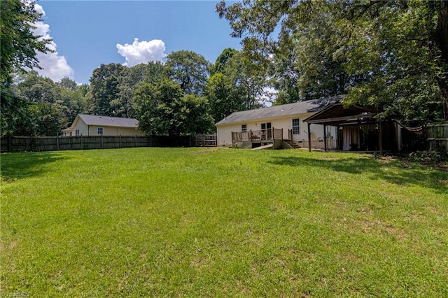 5201 Harvey Rd, Jamestown, NC 27282 - fenced backyard with a wooden deck and a gazebo