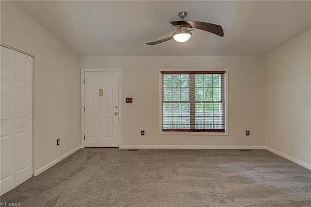 5201 Harvey Rd, Jamestown, NC 27282 - entrance foyer featuring a ceiling fan and carpet