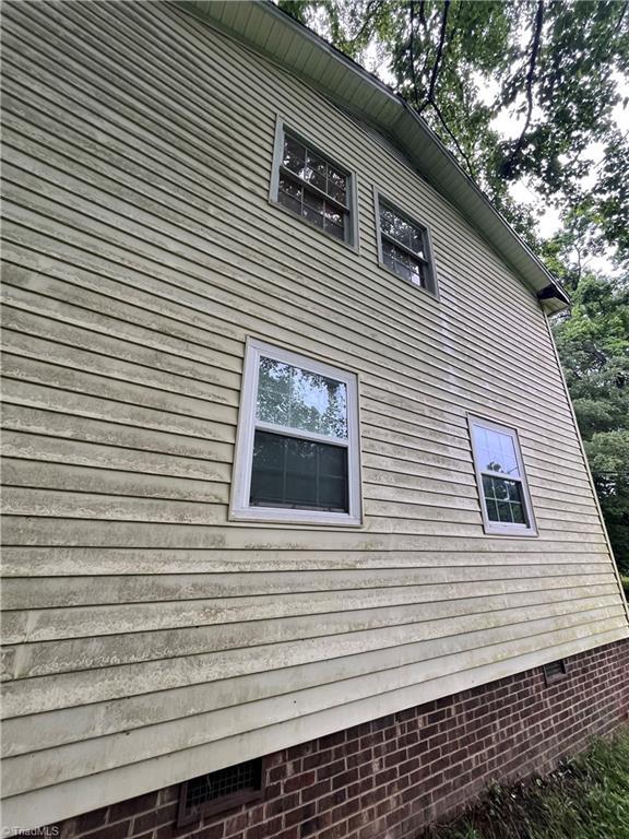 3603 Castleton Rd, Greensboro, NC 27406 - view of side of home featuring crawl space