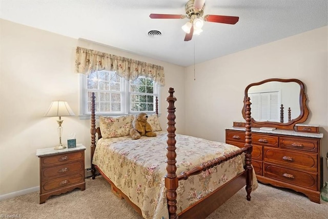 carpeted bedroom featuring ceiling fan