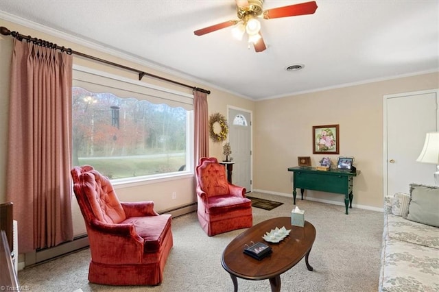 carpeted living room with baseboard heating, ceiling fan, and ornamental molding