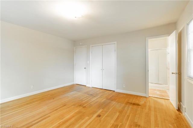 unfurnished bedroom featuring light hardwood / wood-style flooring