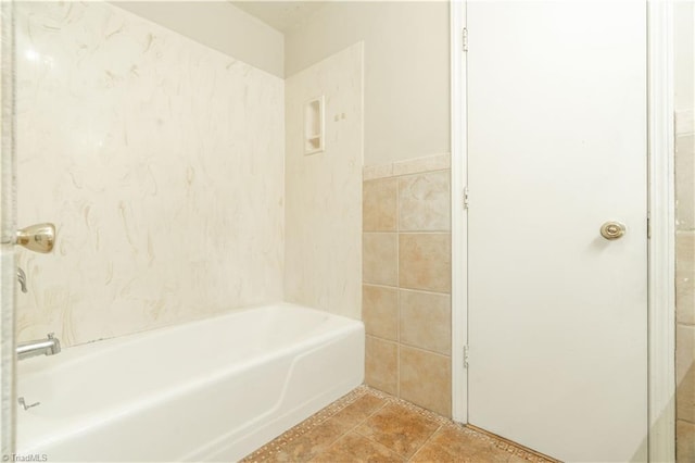 bathroom with  shower combination and tile flooring