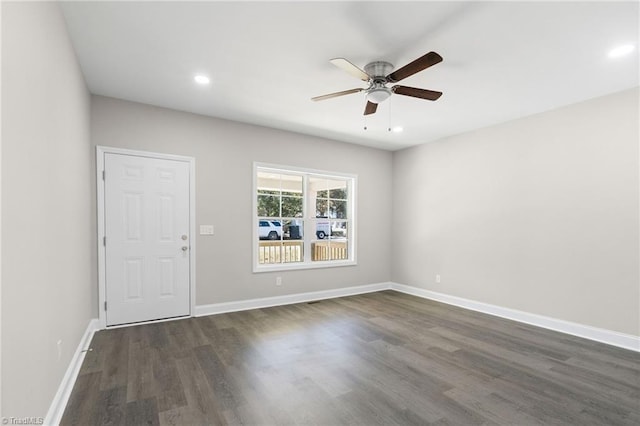 unfurnished room with dark wood-style floors, baseboards, a ceiling fan, and recessed lighting