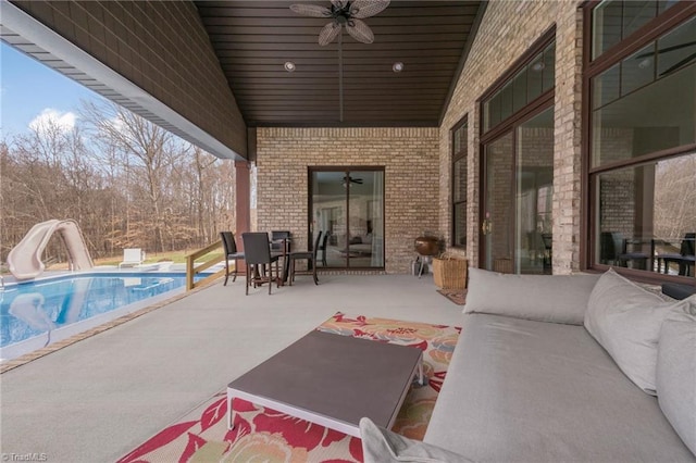 view of patio / terrace featuring ceiling fan