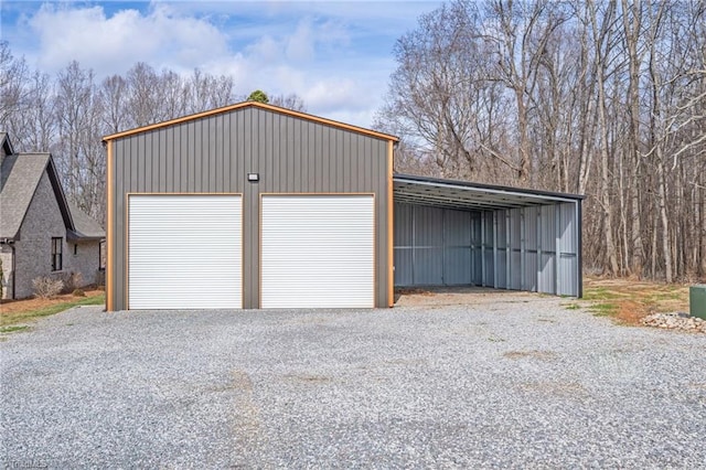 garage with a carport