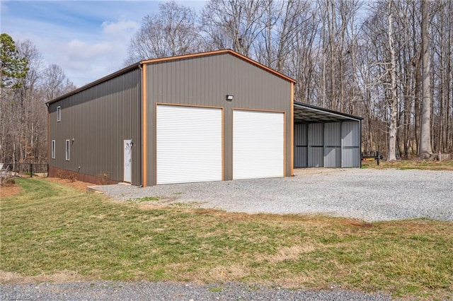 garage with a lawn