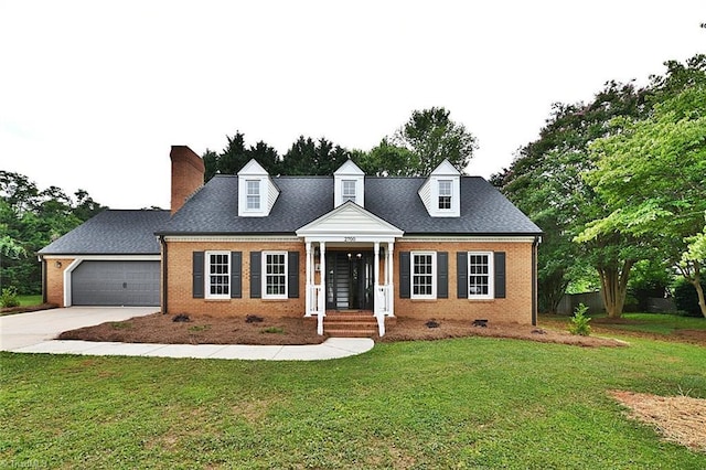 2700 Regency Dr, Winston-Salem, NC 27106 - new england style home featuring brick siding, driveway, a front lawn, and a chimney