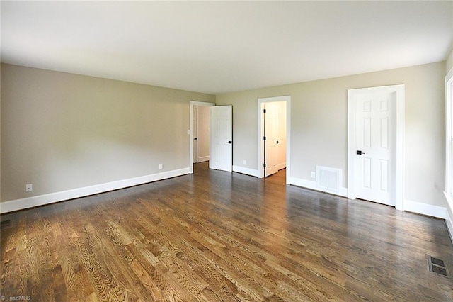 2700 Regency Dr, Winston-Salem, NC 27106 - unfurnished bedroom featuring baseboards and wood finished floors