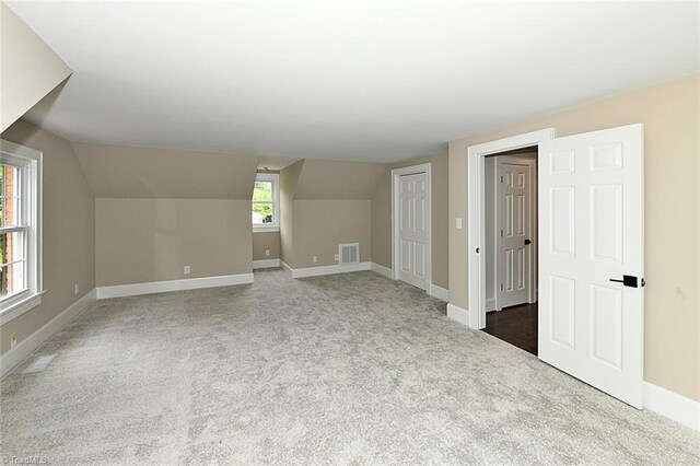2700 Regency Dr, Winston-Salem, NC 27106 - bonus room with carpet flooring, baseboards, and lofted ceiling