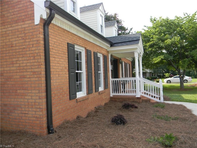 2700 Regency Dr, Winston-Salem, NC 27106 - view of side of property with brick siding and covered porch