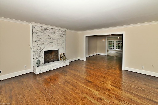 2700 Regency Dr, Winston-Salem, NC 27106 - unfurnished living room with ornamental molding, a fireplace, wood finished floors, and baseboards