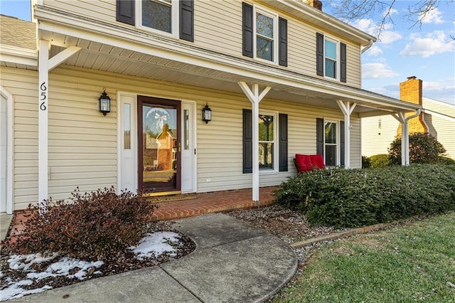 property entrance with a porch