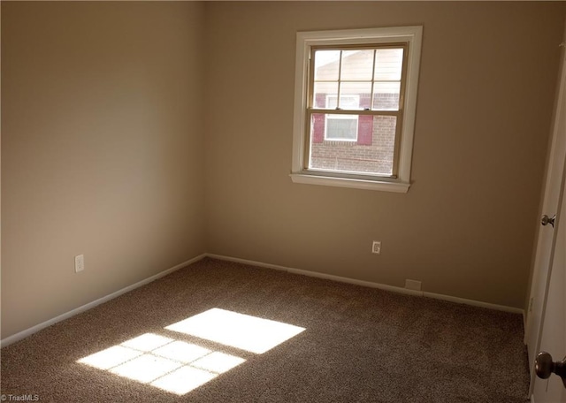 view of carpeted spare room