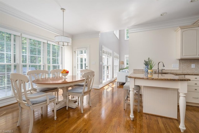 5000 Casting Way, Greensboro, NC 27455 - dining area with light wood-style floors and crown molding