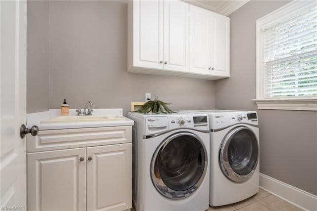 5000 Casting Way, Greensboro, NC 27455 - washroom with cabinet space, washing machine and dryer, and light tile patterned floors
