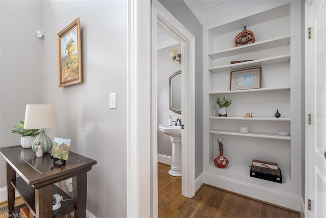 5000 Casting Way, Greensboro, NC 27455 - hall with built in shelves, wood finished floors, and ornamental molding