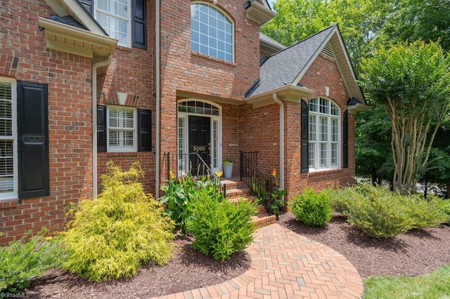 5000 Casting Way, Greensboro, NC 27455 - doorway to property featuring brick siding