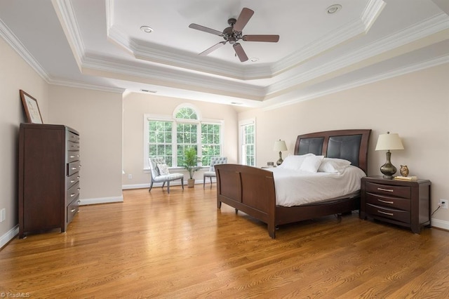 5000 Casting Way, Greensboro, NC 27455 - bedroom with a tray ceiling, light wood-style floors, ornamental molding, and ceiling fan