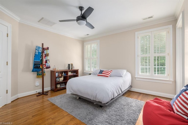 5000 Casting Way, Greensboro, NC 27455 - bedroom featuring wood finished floors, crown molding, and ceiling fan
