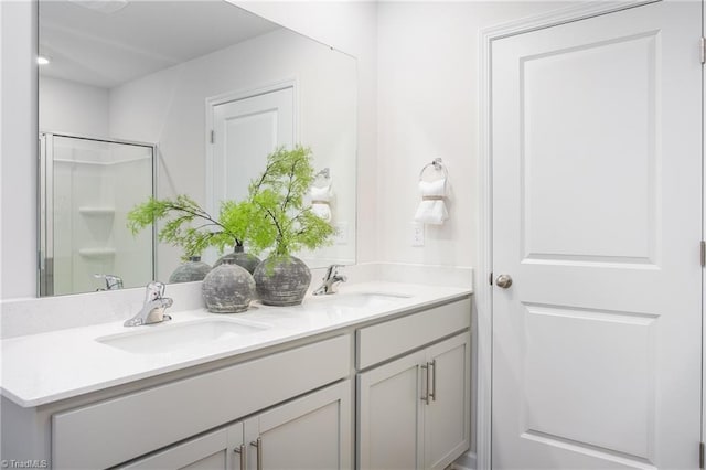 bathroom with vanity and walk in shower