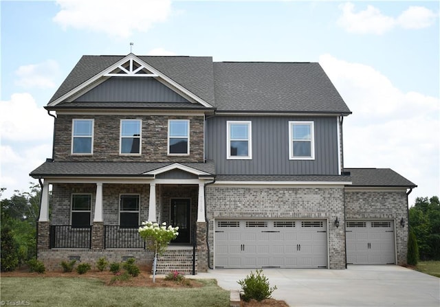 craftsman-style house with a porch and a garage