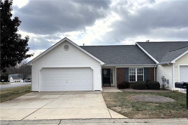 single story home with a garage