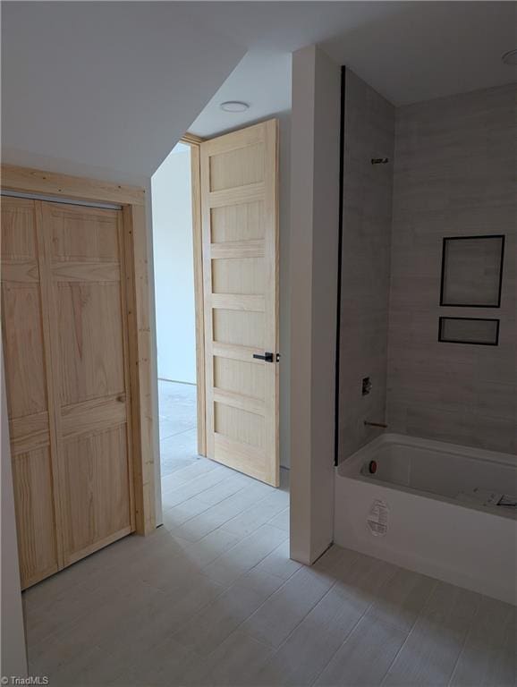 full bathroom featuring washtub / shower combination