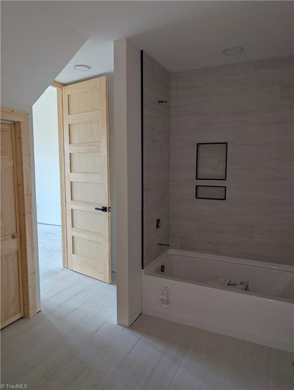 bathroom featuring shower / tub combination