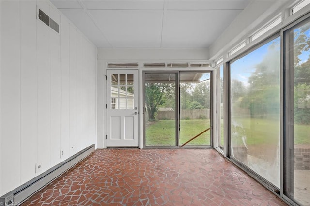 2206 Revolan Dr, Greensboro, NC 27407 - unfurnished sunroom featuring a baseboard radiator and stone finish floors