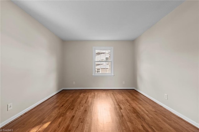 2206 Revolan Dr, Greensboro, NC 27407 - spare room with wood finished floors and baseboards